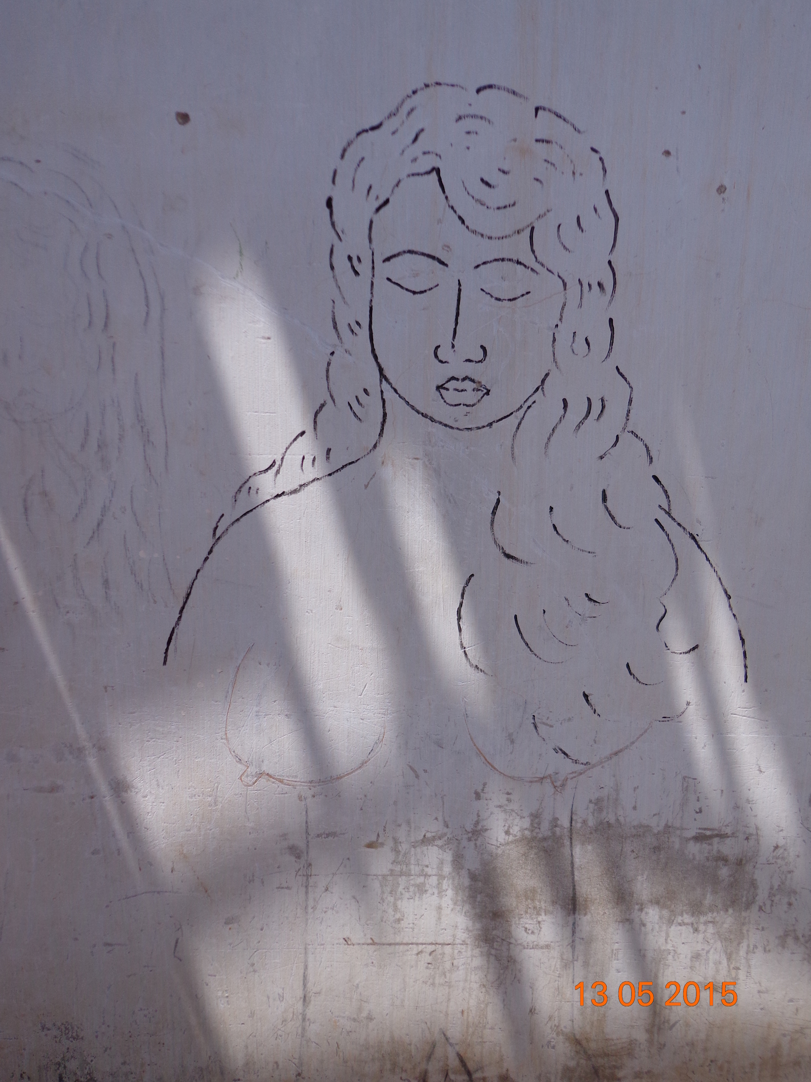 Drawings on walls of damaged houses-2